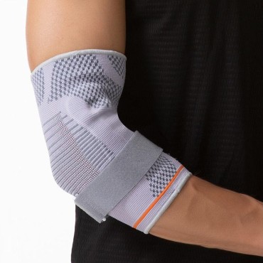 Adjustable compression elastic elbow support